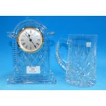 A Waterford crystal mantel clock; a cut pint mug