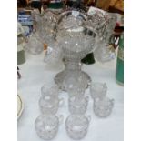 A 1930's pedestal glass punch bowl (in 2 pieces) with cups