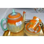 A 1930's Shelley dripware teapot and 2 cups and saucers