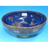 A Carltonware chinoiserie pattern bowl with gilt decoration (hairline crack to base)