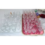 A selection of cut glassware including drinking glasses; pedestal jug; boxed perfume spray; 4