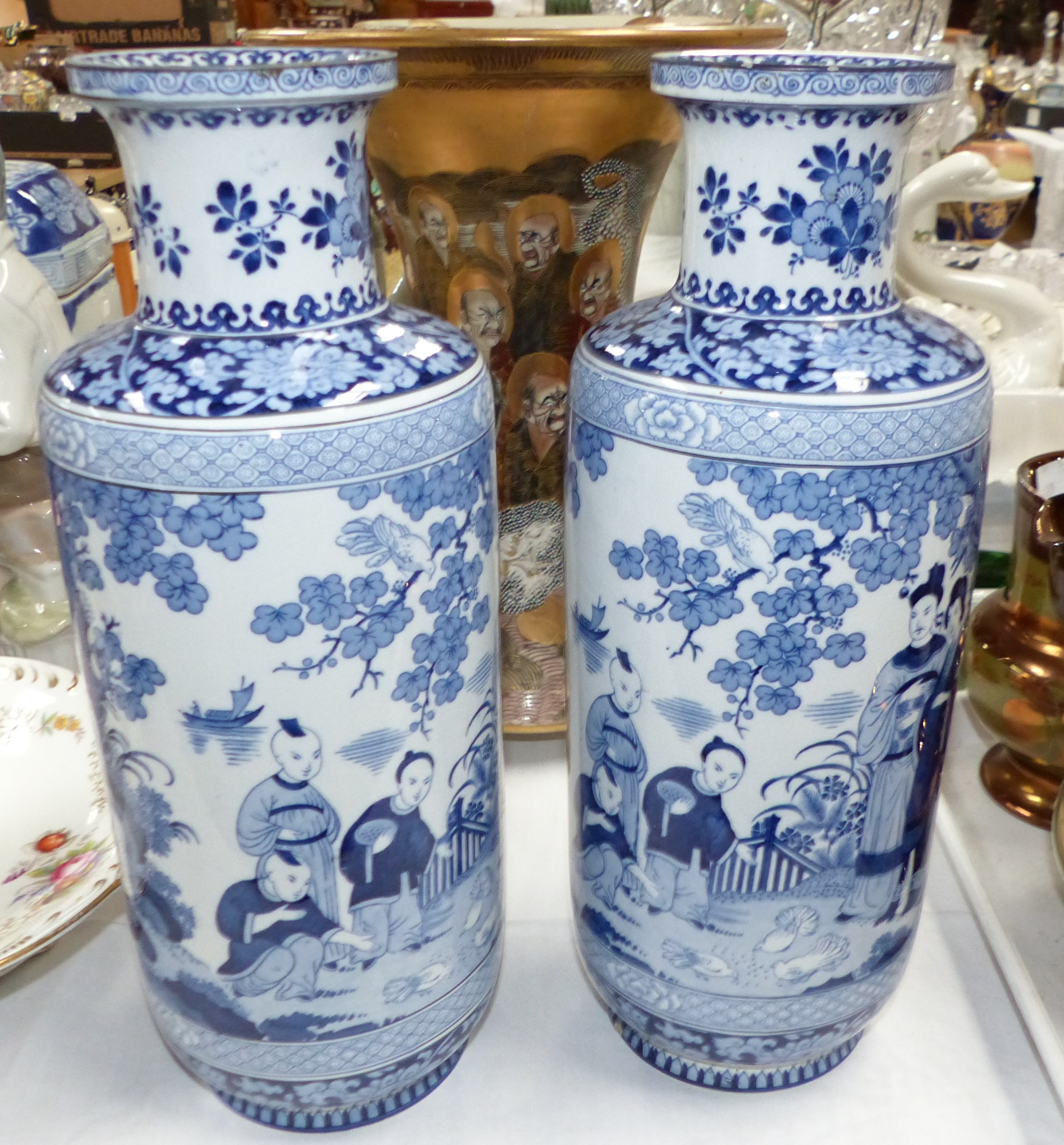 A pair of early 20th century flared and waisted Satsuma vases decorated with Immortals, height 12.5" - Image 4 of 4