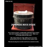 A Japanese Rice Dixie A Japanese patrol was discovered cooking rice in this Dixie beside a river The