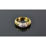18ct Yellow Gold Diamond Gents RingA tapered grooved band with three parallel rows ofbead set