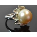 Platinum South Sea Pearl RingA light golden 13mm South Sea Pearl in a stylized stem of textured