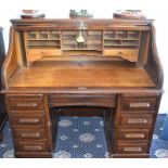An Edwardian Oak, Roll Top Action, Cutler Style DeskEarly 20th centuryThe desk has a roll-top