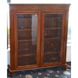 A Victorian Style, Two Door Glazed Teak Bookcasec.1900Having four adjustable interior shelves