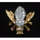 14ct Diamond Bee BroochA yellow gold bee with a diamond set white gold body-textured wings,