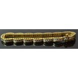 18ct Yellow Gold Diamond Line BraceletA bridge style articulated link line bracelet with80x0.06ct