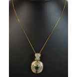 18ct Yellow Gold Emerald Diamond PendantAn oval pendant set with a central 1.20ct emerald and