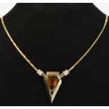 18ct Citrine and Diamond NeckletA handcrafted two tone pendant with a facettedtrilliant cut