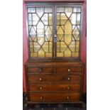 A Georgian Astragal Glazed Two Door BookcaseLate 18th / early 19th centuryThe top part bookcase with