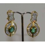 18ct Yellow Gold Emerald Diamond EarringsOval pair of drop earrings with two emeralds 1.20cts