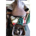 Vintage leather saddle and tack, horse blanket and luggage straps