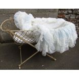 Early 20th century metal cot with mattress and lace insert