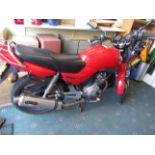 Red Yamaha YBR 125cc 'learner legal' motorbike 2006, 14310 miles, with registration document and