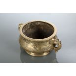 CHINESE BRONZE CENSER  of bombe form and with flat circular rim, the two handles with animal