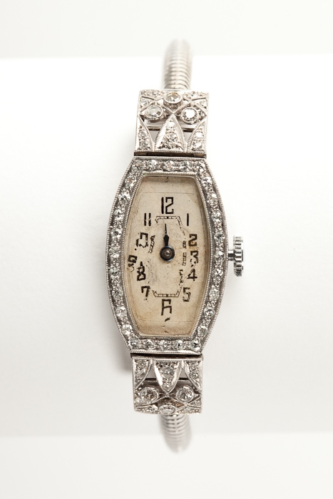 EARLY TWENTIETH CENTURY DIAMOND SET COCKTAIL WATCH  the white dial with Arabic numerals, with