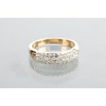 DIAMOND CLUSTER SET BAND with a rectangular section of pave set stones, unmarked