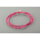 RUBY BEAD NECKLACE formed by graduated faceted ruby beads, the largest bead 4.6mm, the smallest bead