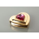 YVES SAINT LAURENT POWDER COMPACT of heart shaped form, the lid set with a large pink paste/plastic