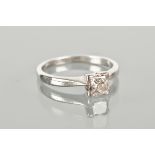 DIAMOND SOLITAIRE RING the princess cut diamond approximately 0.62 carats, in platinum, size L-M