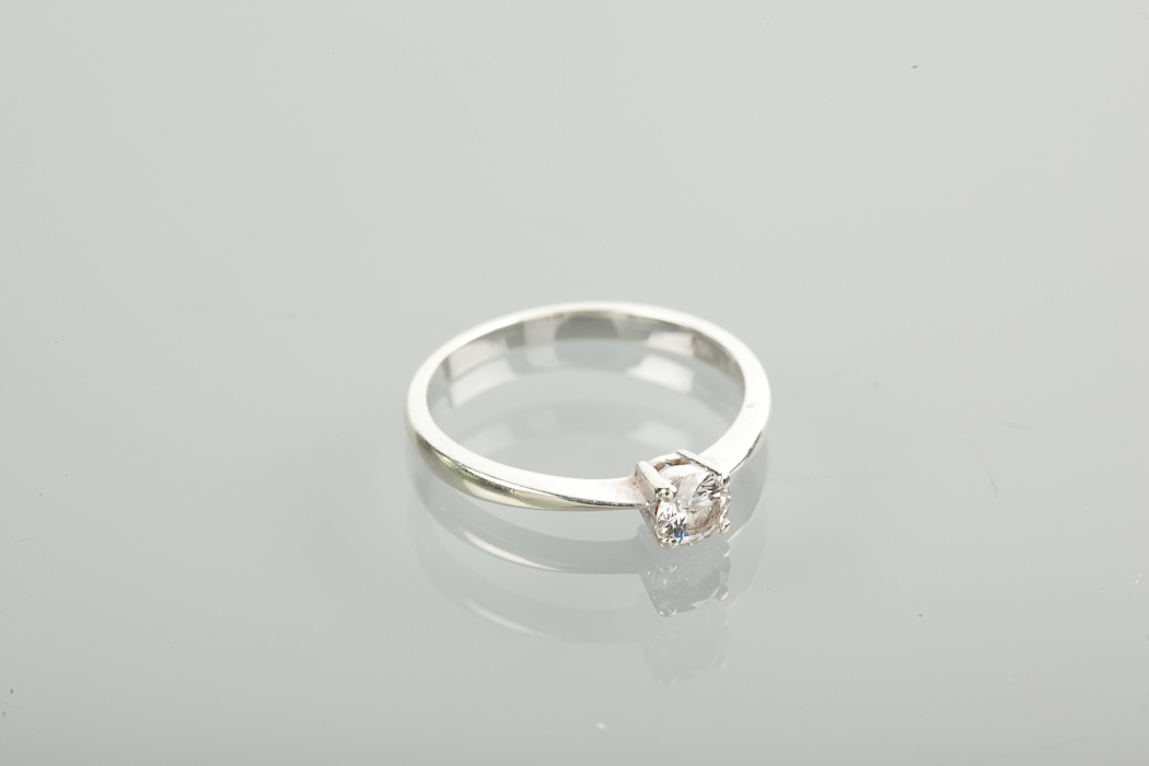 DIAMOND SOLITAIRE RING the brilliant cut diamond of approximately 0.30 carats set in nine carat