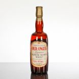 OLD ANGUS LIQUEUR
Blended Scotch whisky. Distilled blended and bottled by Train & McIntyre Ltd. Says