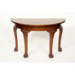 PAIR OF DEMILUNE MAHOGANY SIDE TABLES