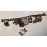 SILVER CHARM BRACELET WITH CHARMS