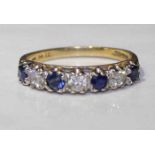 NINE CARAT GOLD SAPPHIRE AND DIAMOND RIN