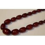 VINTAGE RED CHERRY AMBER BAKELITE BEAD N