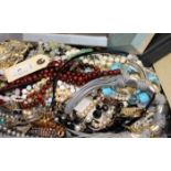 SELECTION OF VINTAGE AND COSTUME JEWELLERY
including necklaces, beads, bangles, faux pearls etc.