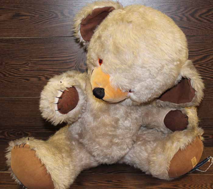 MERRYTHOUGHT TEDDY BEAR
with original label to left foot, over forty years old,