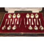 SET OF TWELVE SILVER SPOONS WITH SUGAR TONGS
maker Cooper Brothers & Sons Ltd, Sheffield 1921,