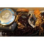 SELECTION OF VINTAGE AND SOME SILVER JEWELLERY
including a garnet bead necklace, an amber brooch,