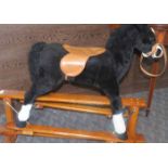 PLUSH ROCKING HORSE
on a wooden frame