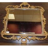 19TH CENTURY STYLE GILT MIRROR
decorated with a scrolling border,