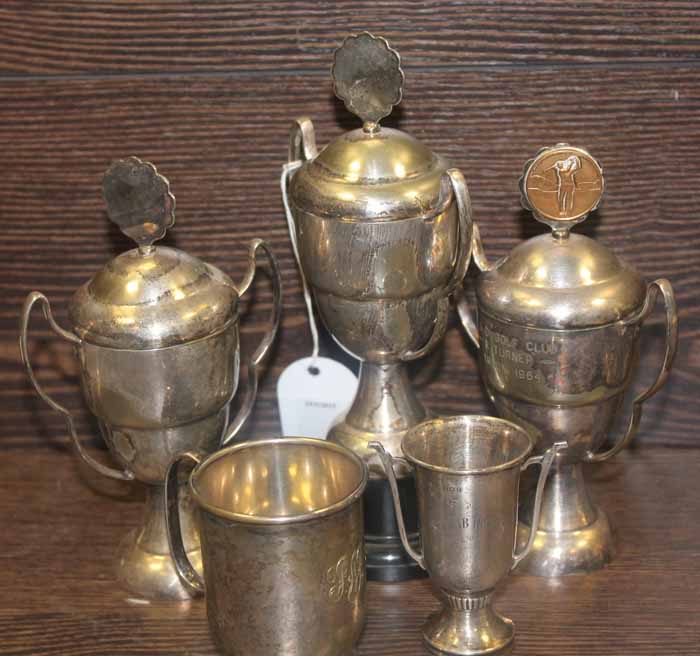 GROUP OF SILVER PLATED GOLF TROPHIES
along with a small silver trophy and a silver plated cup