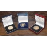 THE CROWN JEWELS GOLD PROOF COIN
set with four precious gems;