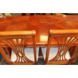 YEW WOOD EXTENDING DINING TABLE AND SIX CHAIRS