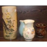 THREE CERAMIC WATER JUGS AND A VASE