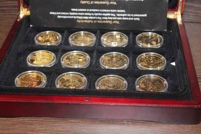 CASED SET OF TWELVE LONDON MINT GILT COINS
celebrating Great British Miltary Heroes and others,