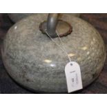 TWO CURLING STONES
with wooden handles,