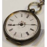 SILVER POCKET WATCH
together with a silver Albert chain