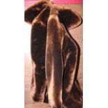 TWO LADIES SHEARLING FUR COATS
including a dark brown and greyish brown example,