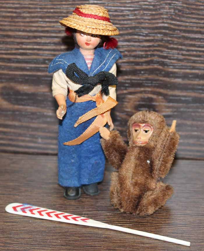 EARLY TO MID 20TH CENTURY MINIATURE SCHUCO MONKEY
along with a mid 20th century Nigerian figure of