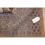 TWO PERSIAN STYLE RUGS
both in pale pink and pastel tones,