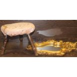 SMALL UPHOLSTERED FOOTSTOOL AND A GILT WALL MIRROR