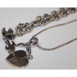 TWO SILVER NECKLACES
one by Thomas Sabo with split heart and bird charms,